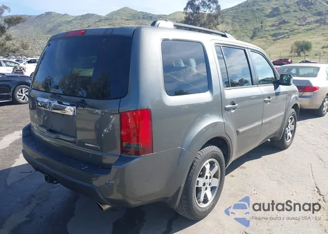 2009 Honda Pilot Touring z USA, uszkodzony, nr VIN 5FNYF38869B016103